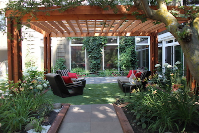 Patio with a pergola and chairs